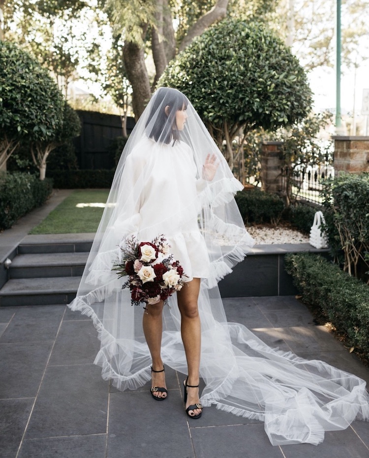 https://www.taniamaras.com/wp-content/uploads/2020/10/Your-guide-to-styling-a-short-wedding-dress-with-a-veil_11.jpeg