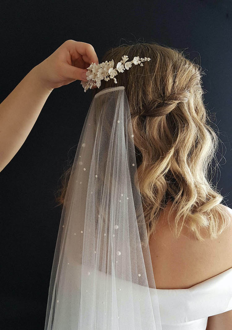 How do you keep a wedding veil comb in place?