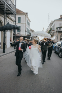 Bride Ali Wears The Draped In Flowers Cape 1.jpg