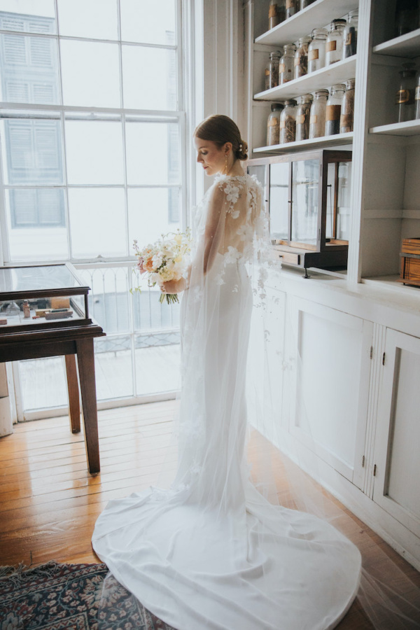 Bride Ali Wears The Draped In Flowers Cape 7.jpg