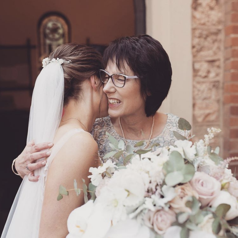 Bride Georgie Wearing Verse Headpiece.png