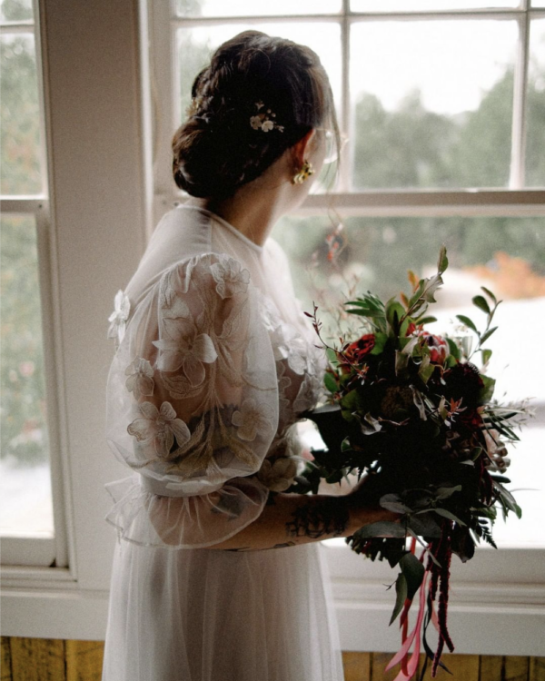 Bride Kelli Wears The Apple Blossom Hair Pins.png