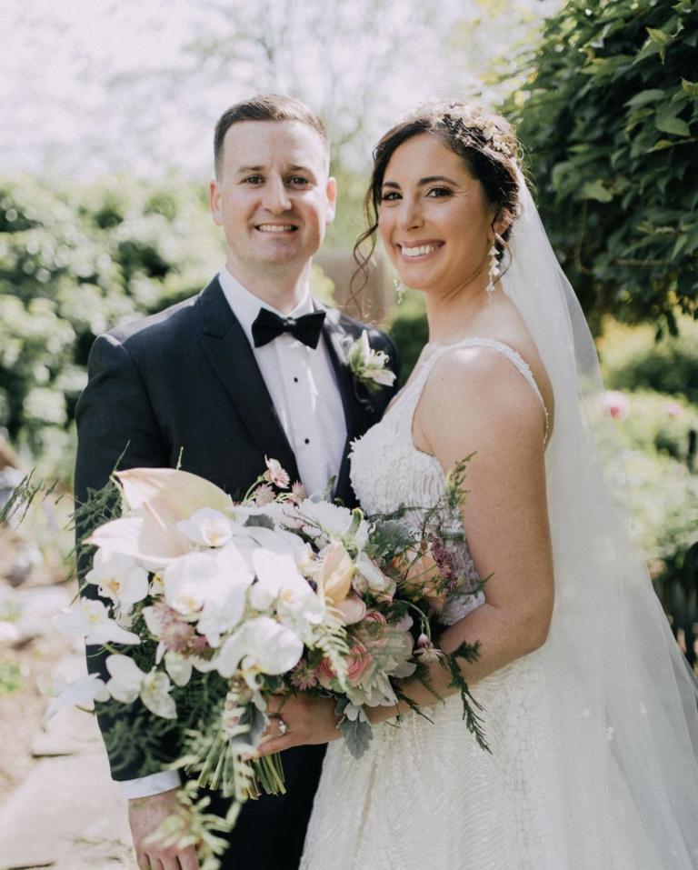 Bride Sophia Wears Cascade Earrings Flores Crown.png