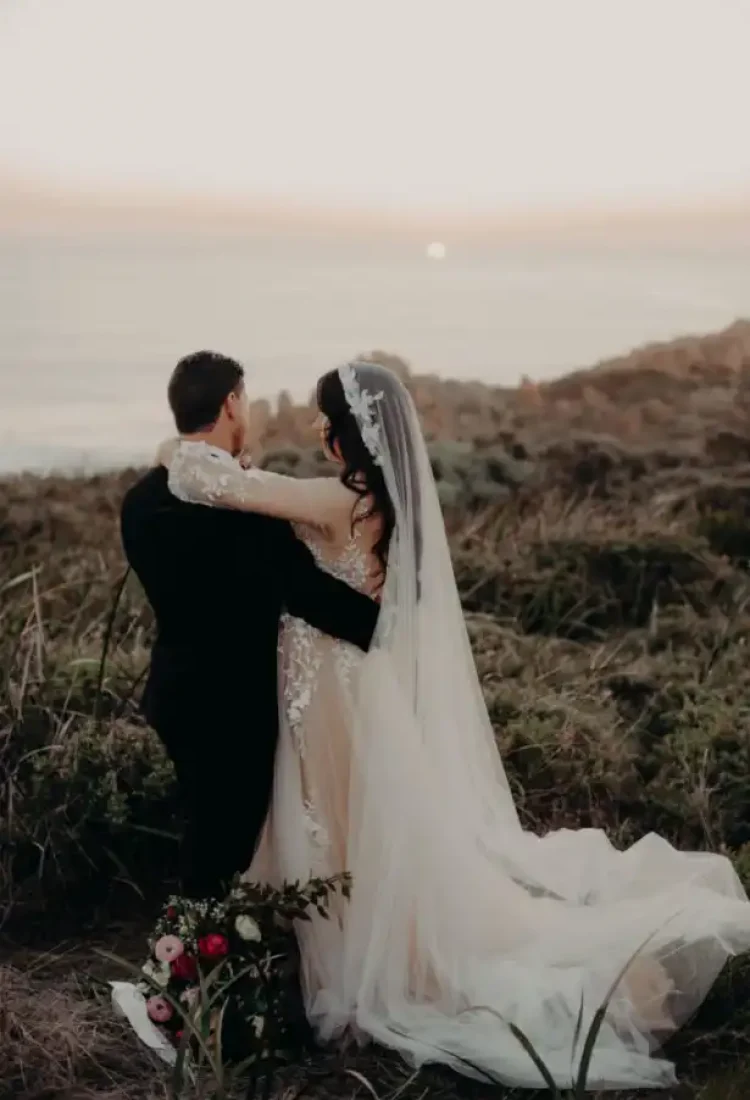 Bride Jessie wears a bespoke Carmen wedding veil