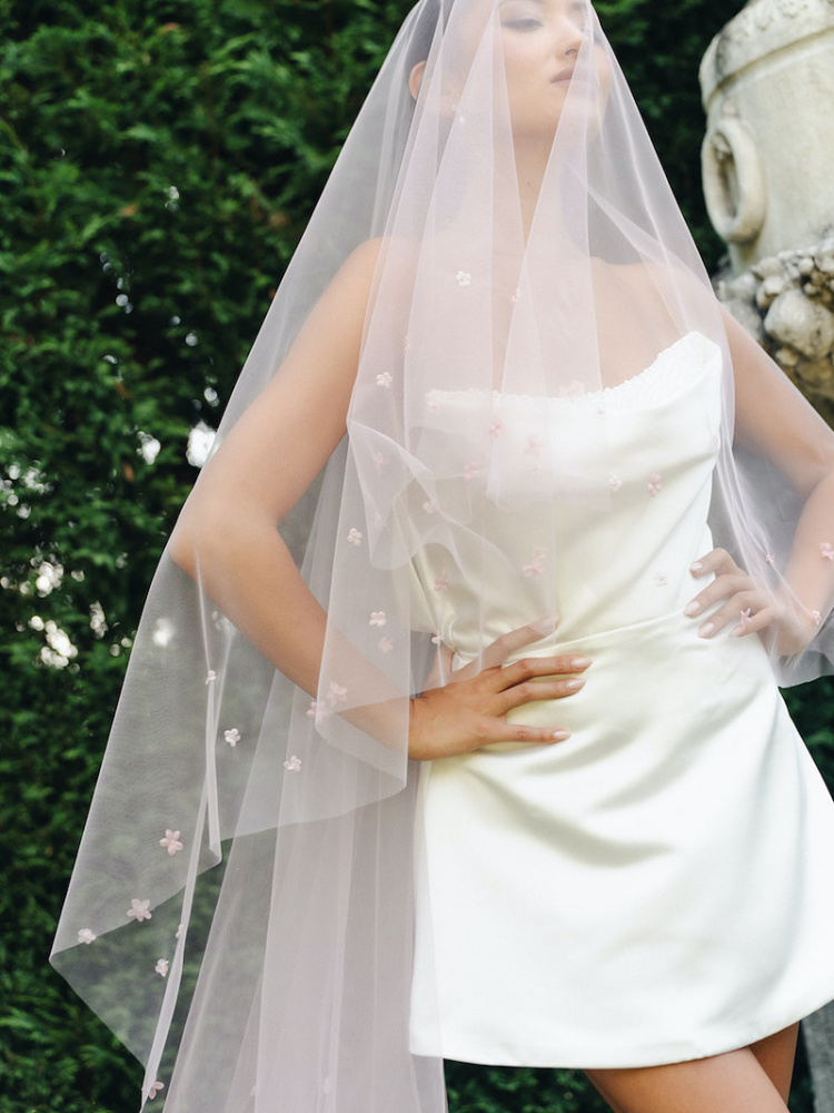 How to accessorise a short wedding dress with a long veil