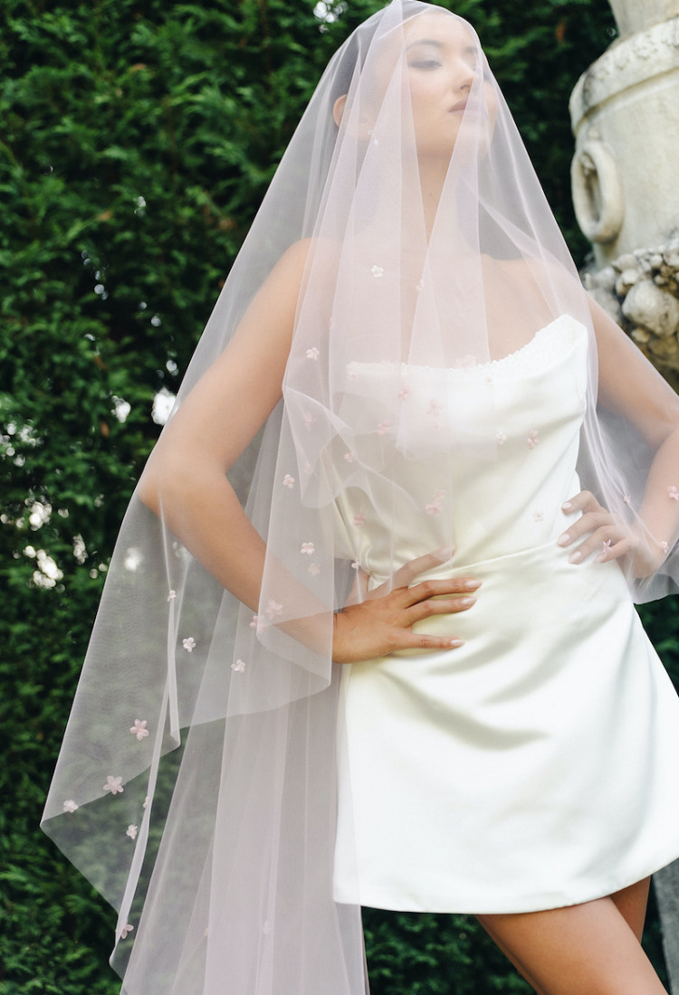 How to accessorise a short wedding dress with a long veil