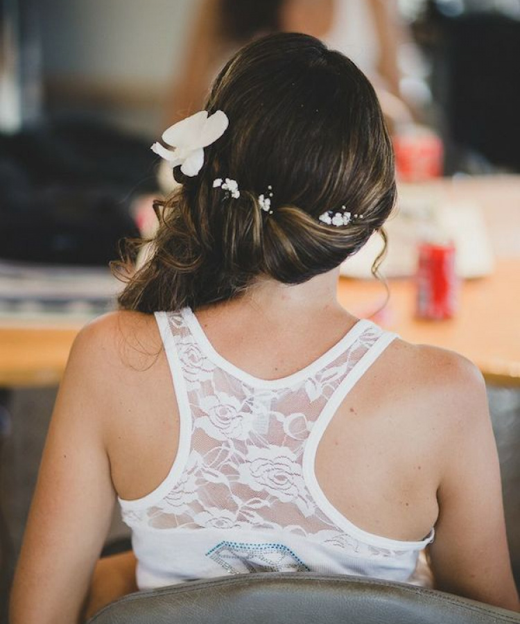 Side Swept Bridal Hair With Scattered Flowers.jpg